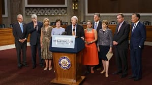 The massive infrastructure package was put together by a bipartisan group of 10 senators. J. Scott Applewhite/AP